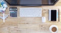 Office table with Objects for business and coffee break on wood background Royalty Free Stock Photo