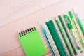 Office table with space, green stationery