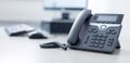 Classical black telephone in the office, customer support and telesale Royalty Free Stock Photo