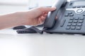 Classical black telephone in the office, customer support and telesale Royalty Free Stock Photo