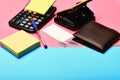 Office tools: calculator, hole punch, card, note paper, pen, clips Royalty Free Stock Photo