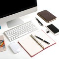 Office tools and PC on desk isolated on a white background Royalty Free Stock Photo