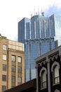 Office tower with old buildings. Royalty Free Stock Photo