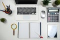 office white desk with laptop nad tablet pen mouse and keyboard for creatice work