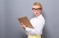 Office woman with a clipboard Royalty Free Stock Photo