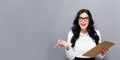 Office woman with a clipboard Royalty Free Stock Photo