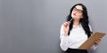 Office woman with a clipboard Royalty Free Stock Photo