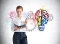 Office woman with light bulb with brain and gears Royalty Free Stock Photo