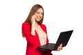 Office woman looking at camera smiling, Holding a laptop and talking on the phone Royalty Free Stock Photo