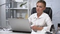 Office woman with napkin in her hands sneezing, lacrimation, allergic rhinitis