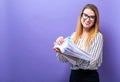 Office woman with a stack of documents Royalty Free Stock Photo