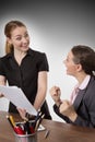 Office Women looking at Documents Royalty Free Stock Photo