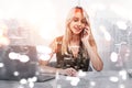 Young businesswoman call on the phone, laptop and skyscrapers Royalty Free Stock Photo