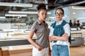 When in office work should be your primary duty. Female co-workers posing in office Royalty Free Stock Photo