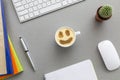 Office work space on grey desk with cactus and Royalty Free Stock Photo