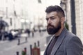 Office worker. Bearded man going to work. Hipster in business style on street. Business man in modern city. Professional Royalty Free Stock Photo