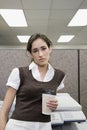 Office worker with coffee Royalty Free Stock Photo