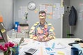 Office worker covered with stick notes