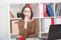 Office worker looking at the camera through a magnifying glass. Subject: search interenet Royalty Free Stock Photo