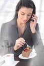 Office worker on phone call in cafe Royalty Free Stock Photo