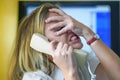 Unhappy woman crying in the phone