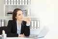 Office worker pointing at side to a blank space