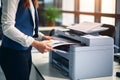 Office worker print paper on multifunction laser printer. Document and paperwork. Secretary work. Woman working in business office Royalty Free Stock Photo