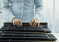 Office worker searching files in the archive Royalty Free Stock Photo