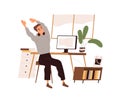 Office worker stretching at break after work with computer. Happy man sitting at workplace at end of workday. Employee