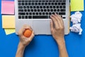 Office worker typing email on computer