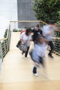 Office worker walking up stairs, motion blur Royalty Free Stock Photo
