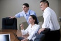 Office workers in boardroom watching presentation Royalty Free Stock Photo