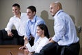 Office workers in boardroom watching presentation Royalty Free Stock Photo