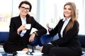 Office workers on coffee break, woman enjoying chatting Royalty Free Stock Photo