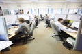 Office workers of company RUSELPROM sit at computers