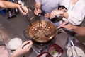 5 office workers eating hot pot stewed beef Royalty Free Stock Photo