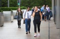 Office workers going at work. Early morning hours in Canary Wharf , London Royalty Free Stock Photo