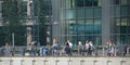 Office workers going at work. Early morning hours in Canary Wharf , London Royalty Free Stock Photo