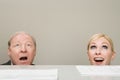 Office workers looking up in surprise Royalty Free Stock Photo