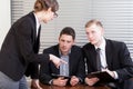 Office workers during meeting with manager Royalty Free Stock Photo