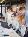 Office workers review plans and projects on the laptop