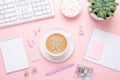 Office workplace desk table with computer, succulent, supplies and coffee in pastel colors. Top view Royalty Free Stock Photo