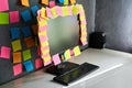 Office workplace with desktop pc full of blank colorful sticky notes Royalty Free Stock Photo