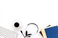 Office workplace. Headphones, keyboard, notebook on white desk top-down copy space Royalty Free Stock Photo