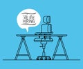 Office workplace with we are hiring message Royalty Free Stock Photo