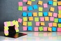 Office workplace with laptop and blank colorful sticky notes reminders Royalty Free Stock Photo