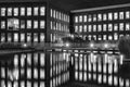 Officebuilding in Zoetermeer, Netherlands by night with reflection in the water in black and white Royalty Free Stock Photo