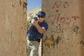 Officer Aiming Hand Gun At Firing Range