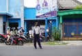 The officer of Department of Transportation regulate road traffic