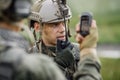 Officer holds a radio station, and give orders subdivision